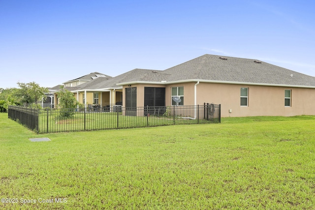 3724 Sandhill Crane Cir, Mims, FL 32754 - rear view of house with stucco siding and roof with shingles