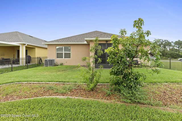 3724 Sandhill Crane Cir, Mims, FL 32754 - view of home's exterior featuring stucco siding, a fenced backyard, a sunroom, and a shingled roof