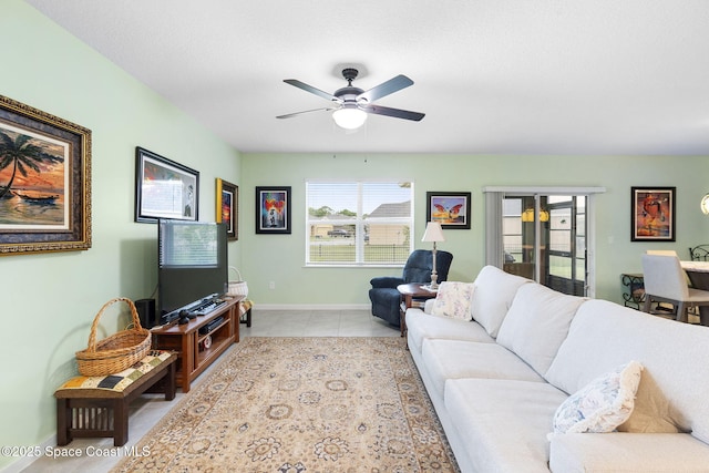 3724 Sandhill Crane Cir, Mims, FL 32754 - living area with a ceiling fan and tile patterned floors