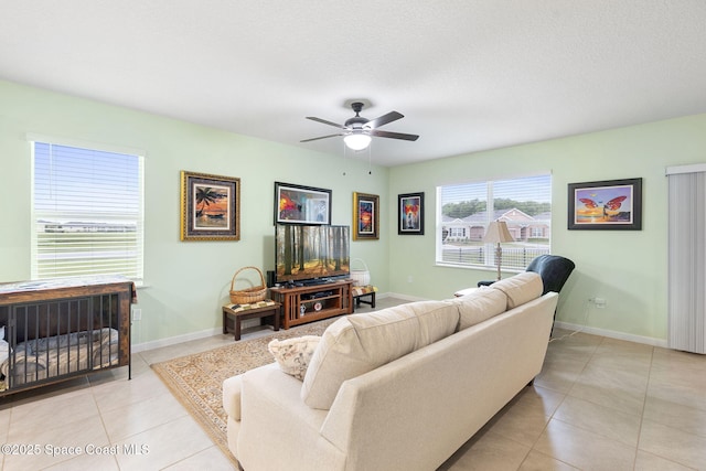 3724 Sandhill Crane Cir, Mims, FL 32754 - living room featuring ceiling fan and light tile patterned floors
