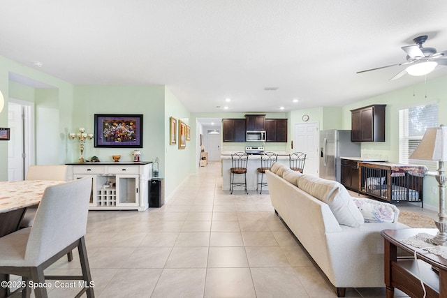 3724 Sandhill Crane Cir, Mims, FL 32754 - living area featuring a ceiling fan, light tile patterned floors, and recessed lighting