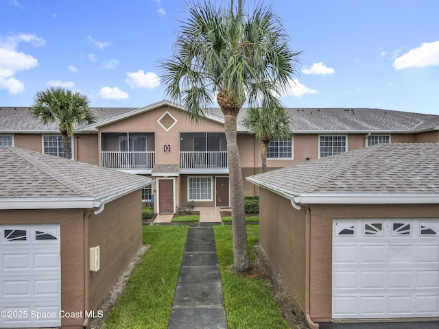 1870 Long Iron Dr Unit 1225, Rockledge, FL 32955 - view of front facade featuring stucco siding
