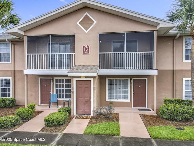 1870 Long Iron Dr Unit 1225, Rockledge, FL 32955 - townhome / multi-family property featuring stucco siding