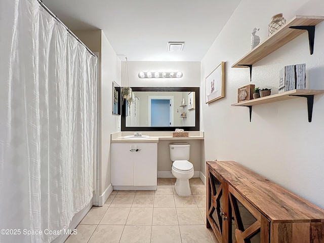 1870 Long Iron Dr Unit 1225, Rockledge, FL 32955 - bathroom with vanity, tile patterned flooring, and a shower with shower curtain
