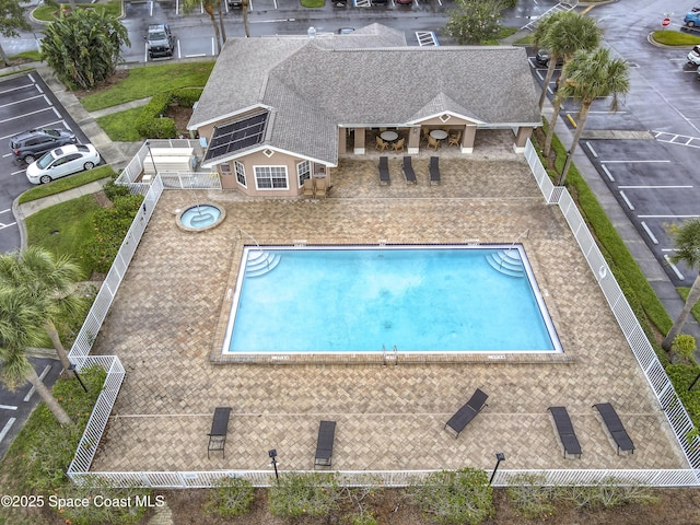 1870 Long Iron Dr Unit 1225, Rockledge, FL 32955 - community pool with a fenced backyard and a patio