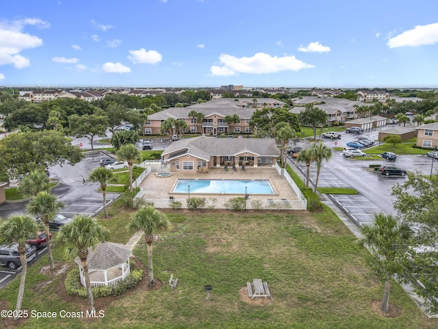 1870 Long Iron Dr Unit 1225, Rockledge, FL 32955 - aerial perspective of suburban area featuring a pool area