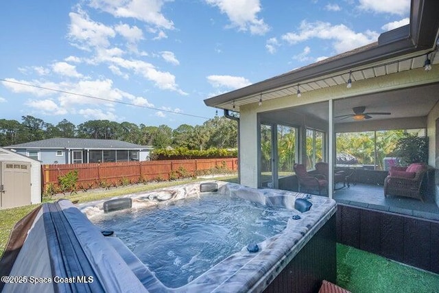 793 Ontario St NW, Palm Bay, FL 32907 - wooden terrace with a shed, a sunroom, a hot tub, and ceiling fan