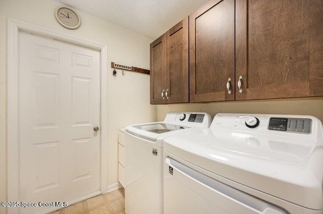 793 Ontario St NW, Palm Bay, FL 32907 - laundry room with washer and clothes dryer, cabinet space, a textured ceiling, and light floors