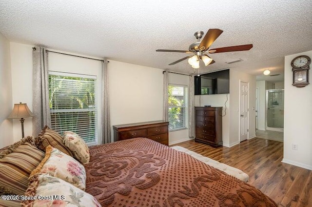 793 Ontario St NW, Palm Bay, FL 32907 - bedroom with wood finished floors, a textured ceiling, and a ceiling fan
