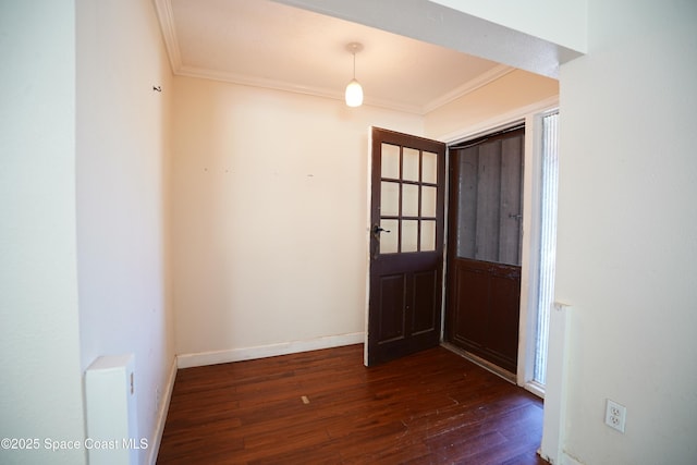 614 W Ct, Titusville, FL 32796 - foyer entrance featuring ornamental molding and dark wood-style floors