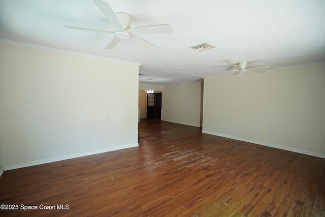 614 W Ct, Titusville, FL 32796 - spare room with a ceiling fan, ornamental molding, a chandelier, and wood finished floors