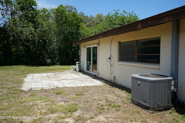 614 W Ct, Titusville, FL 32796 - view of grassy yard featuring a patio