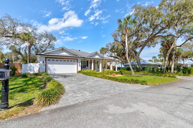 105 Azalea Cir, New Smyrna Beach, FL 32168 - single story home with a garage and driveway