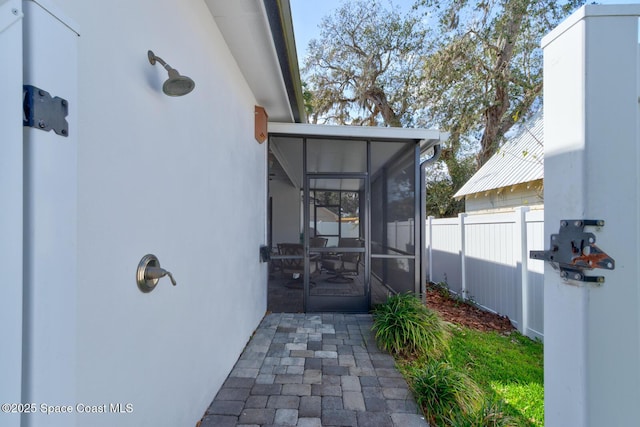 105 Azalea Cir, New Smyrna Beach, FL 32168 - doorway to property with stucco siding