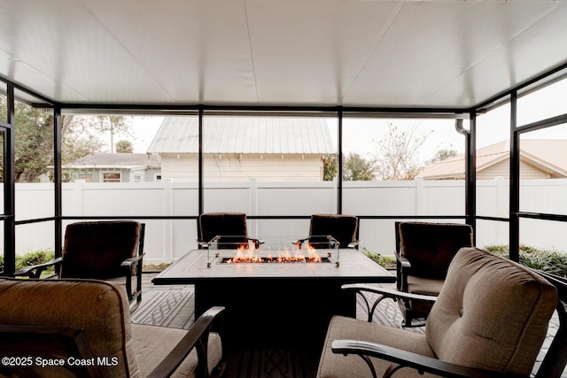 105 Azalea Cir, New Smyrna Beach, FL 32168 - sunroom with an outdoor fire pit