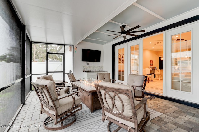 105 Azalea Cir, New Smyrna Beach, FL 32168 - sunroom / solarium featuring ceiling fan and outdoor dining space