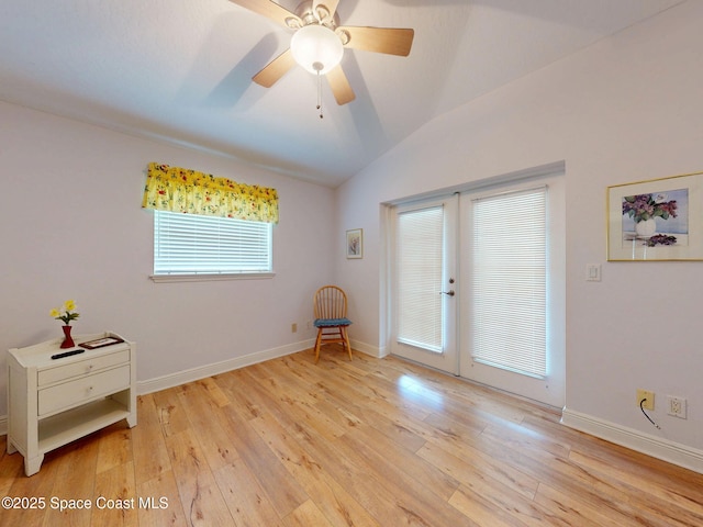 6025 Brabrook Ave, Grant, FL 32949 - unfurnished room with french doors, light wood-style flooring, vaulted ceiling, and ceiling fan