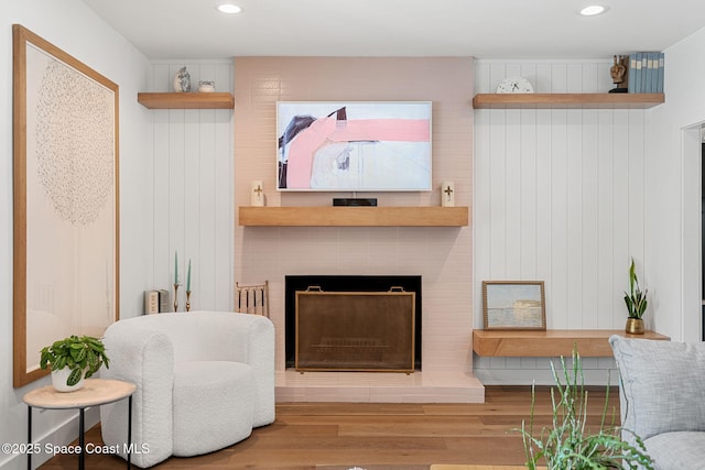 2600 N Riverside Dr, Indialantic, FL 32903 - living area featuring wood finished floors, recessed lighting, and a fireplace