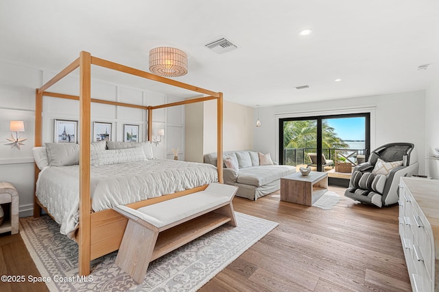 2600 N Riverside Dr, Indialantic, FL 32903 - bedroom with light wood-style flooring and recessed lighting