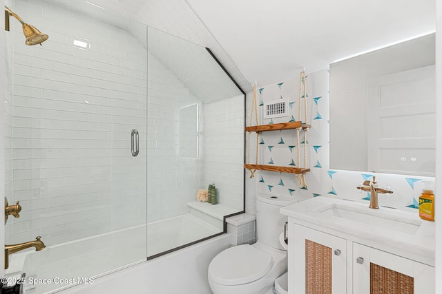 2600 N Riverside Dr, Indialantic, FL 32903 - bathroom featuring bath / shower combo with glass door and vanity