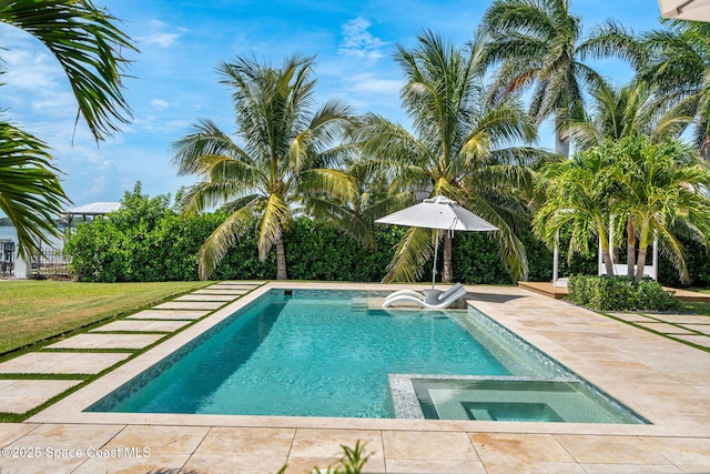 2600 N Riverside Dr, Indialantic, FL 32903 - view of swimming pool with a patio area and a pool with connected hot tub