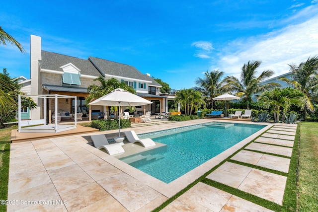2600 N Riverside Dr, Indialantic, FL 32903 - swimming pool featuring a patio and outdoor dining space