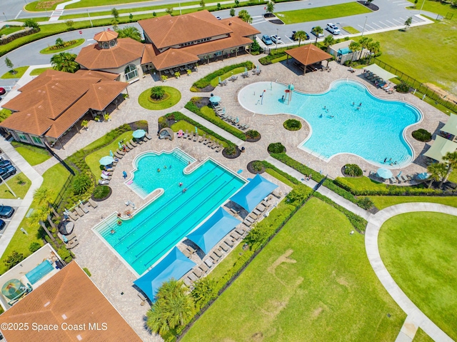 7873 Desmond Ave, Melbourne, FL 32940 - drone / aerial view of a pool
