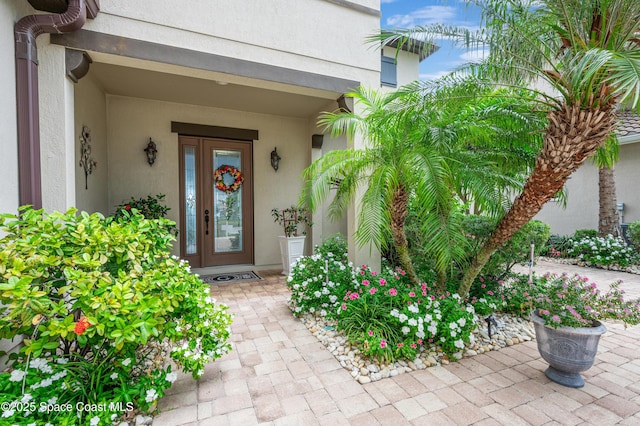 7873 Desmond Ave, Melbourne, FL 32940 - property entrance with stucco siding