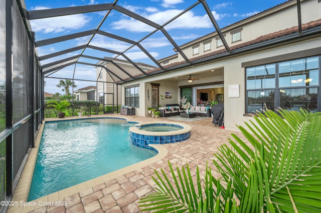 7873 Desmond Ave, Melbourne, FL 32940 - view of swimming pool with an outdoor hangout area, a patio, a ceiling fan, a pool with connected hot tub, and a lanai