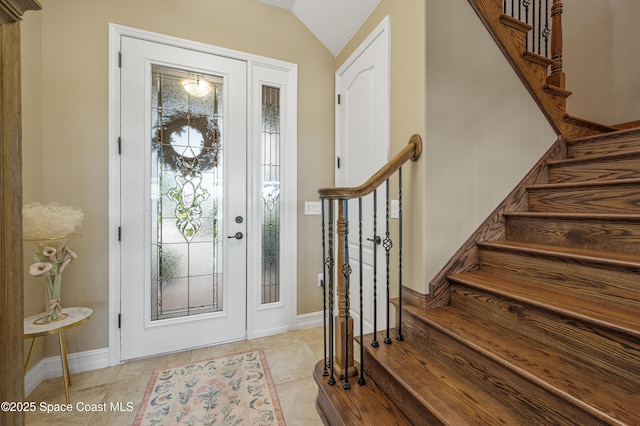 7873 Desmond Ave, Melbourne, FL 32940 - entryway with stairs and vaulted ceiling