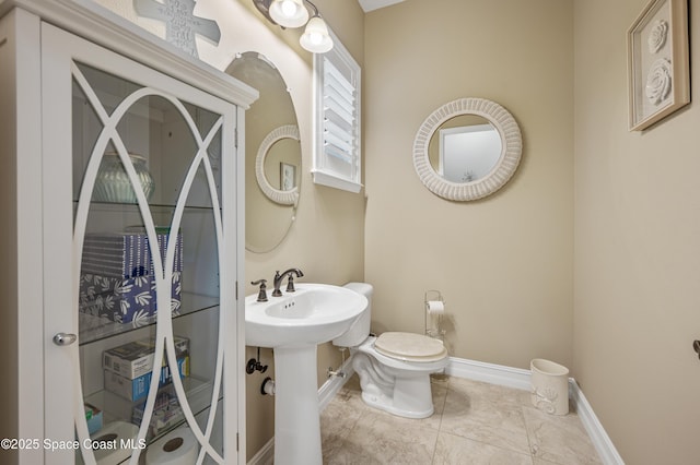 7873 Desmond Ave, Melbourne, FL 32940 - half bath featuring toilet and baseboards