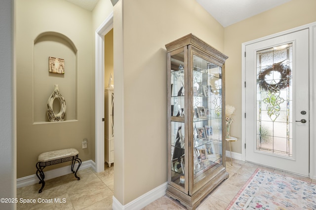 7873 Desmond Ave, Melbourne, FL 32940 - foyer featuring baseboards