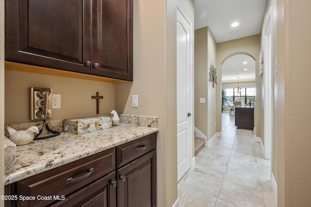 7873 Desmond Ave, Melbourne, FL 32940 - laundry area featuring arched walkways and recessed lighting