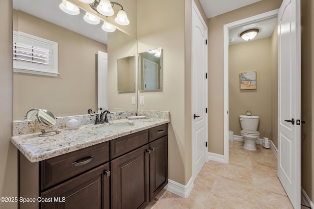 7873 Desmond Ave, Melbourne, FL 32940 - bathroom featuring vanity and toilet
