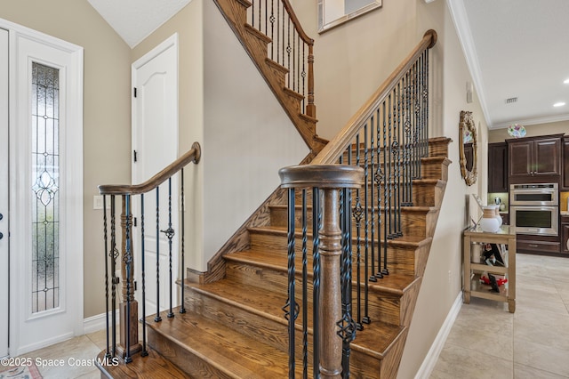 7873 Desmond Ave, Melbourne, FL 32940 - staircase featuring crown molding and tile patterned flooring