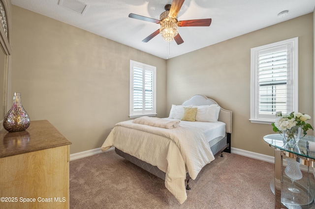 7873 Desmond Ave, Melbourne, FL 32940 - bedroom with carpet and ceiling fan