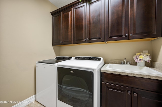 7873 Desmond Ave, Melbourne, FL 32940 - washroom featuring separate washer and dryer and cabinet space