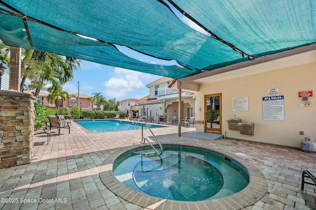 1375 Isabella Dr Unit 108, Melbourne, FL 32935 - community pool featuring a hot tub and a patio