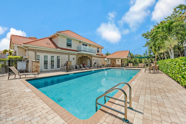 1375 Isabella Dr Unit 108, Melbourne, FL 32935 - community pool featuring french doors and a patio area