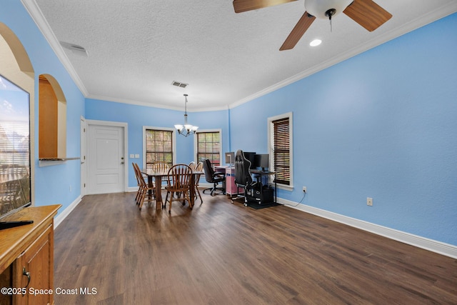 1375 Isabella Dr Unit 108, Melbourne, FL 32935 - dining room with a chandelier, a ceiling fan, dark wood-type flooring, ornamental molding, and a textured ceiling