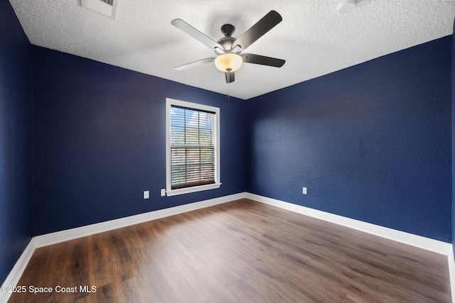 1375 Isabella Dr Unit 108, Melbourne, FL 32935 - empty room with wood finished floors, a textured ceiling, and a ceiling fan