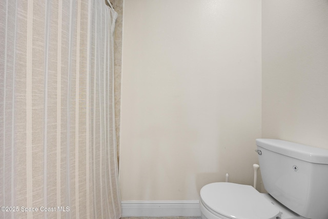1375 Isabella Dr Unit 108, Melbourne, FL 32935 - full bathroom featuring toilet and baseboards