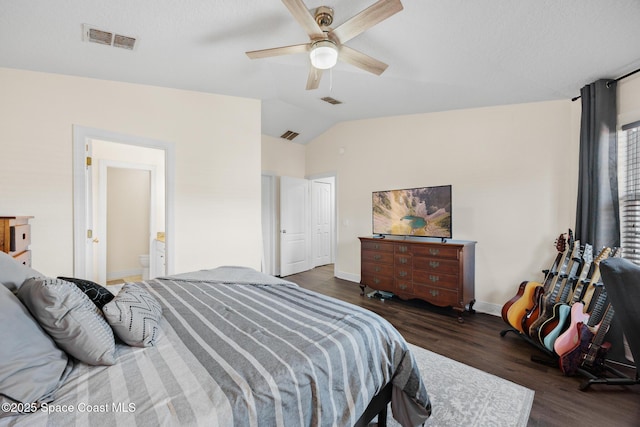 1375 Isabella Dr Unit 108, Melbourne, FL 32935 - bedroom featuring wood finished floors, lofted ceiling, a ceiling fan, and ensuite bathroom