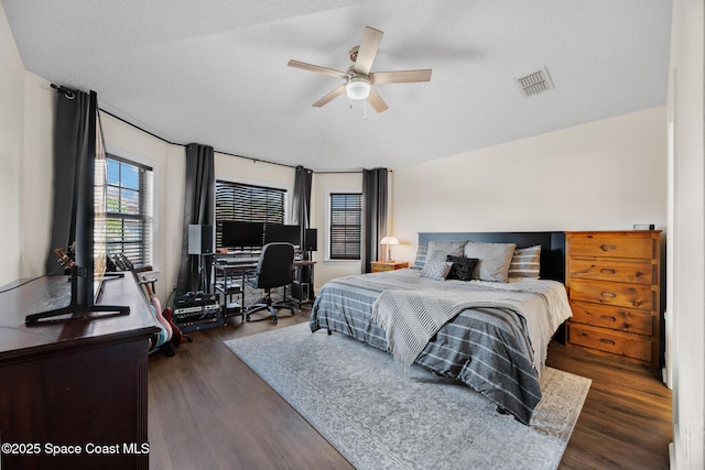 1375 Isabella Dr Unit 108, Melbourne, FL 32935 - bedroom featuring dark wood finished floors, a desk, and ceiling fan