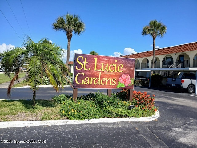201 Saint Lucie Ln Unit 309, Cocoa Beach, FL 32931 - community sign featuring covered parking