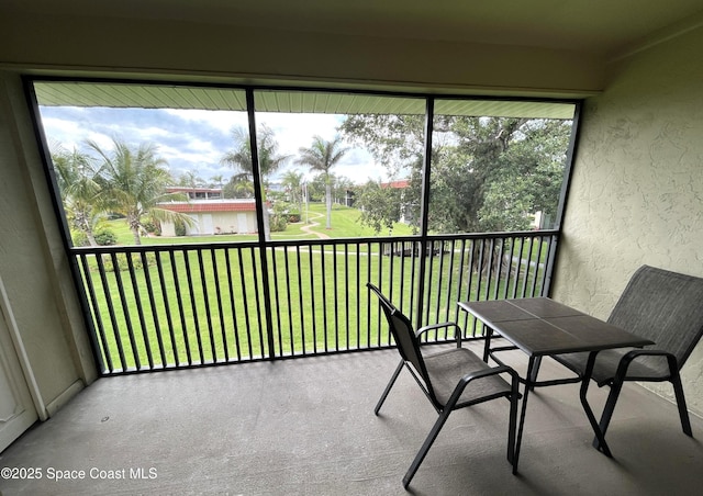 201 Saint Lucie Ln Unit 309, Cocoa Beach, FL 32931 - sunroom / solarium with a water view