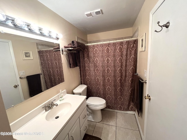 201 Saint Lucie Ln Unit 309, Cocoa Beach, FL 32931 - bathroom featuring tile patterned floors, vanity, and a shower with shower curtain