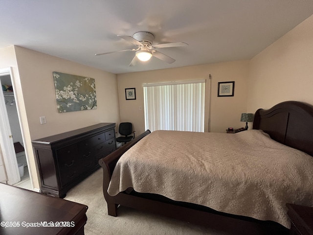 201 Saint Lucie Ln Unit 309, Cocoa Beach, FL 32931 - bedroom featuring a ceiling fan and light carpet