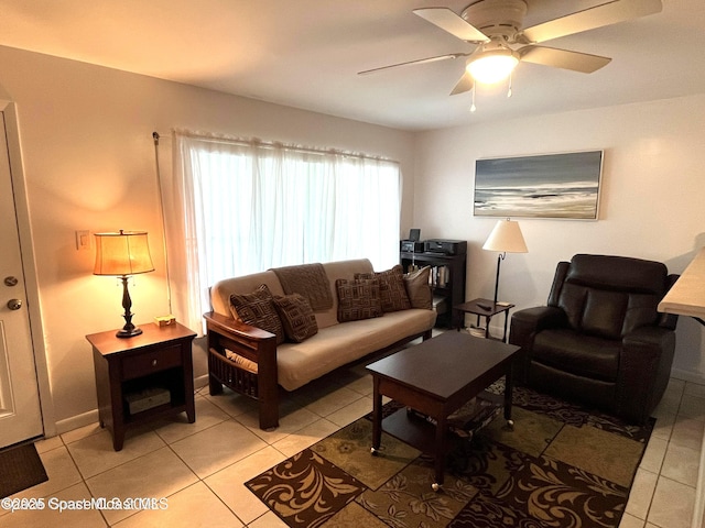 201 Saint Lucie Ln Unit 309, Cocoa Beach, FL 32931 - living room featuring light tile patterned flooring and a ceiling fan