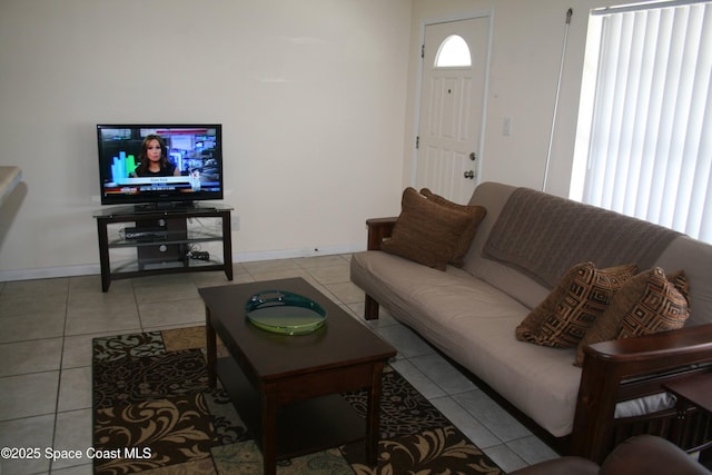 201 Saint Lucie Ln Unit 309, Cocoa Beach, FL 32931 - living area with light tile patterned floors